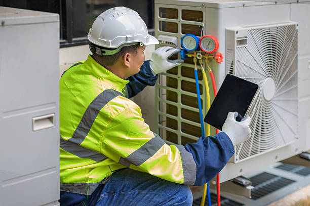 Professional Air Conditioning Repair technician working in Palestine, IL